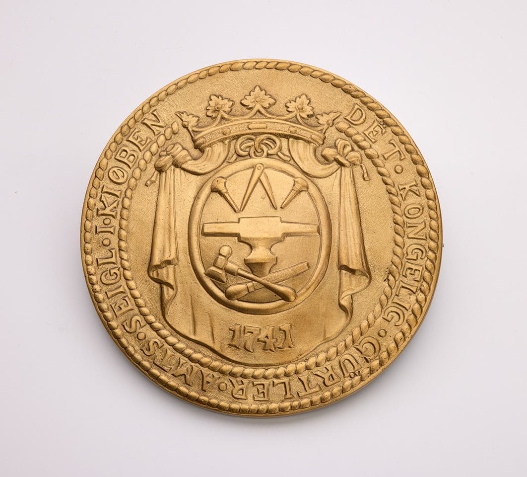 gørtlerlaugets emblem støbt af Søe-Jensen